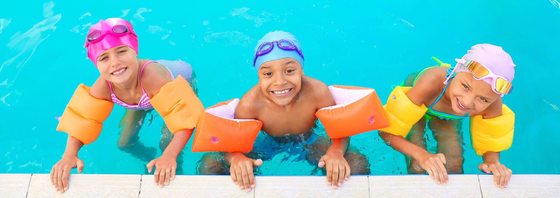 Cute Little Children In Swimming Pool